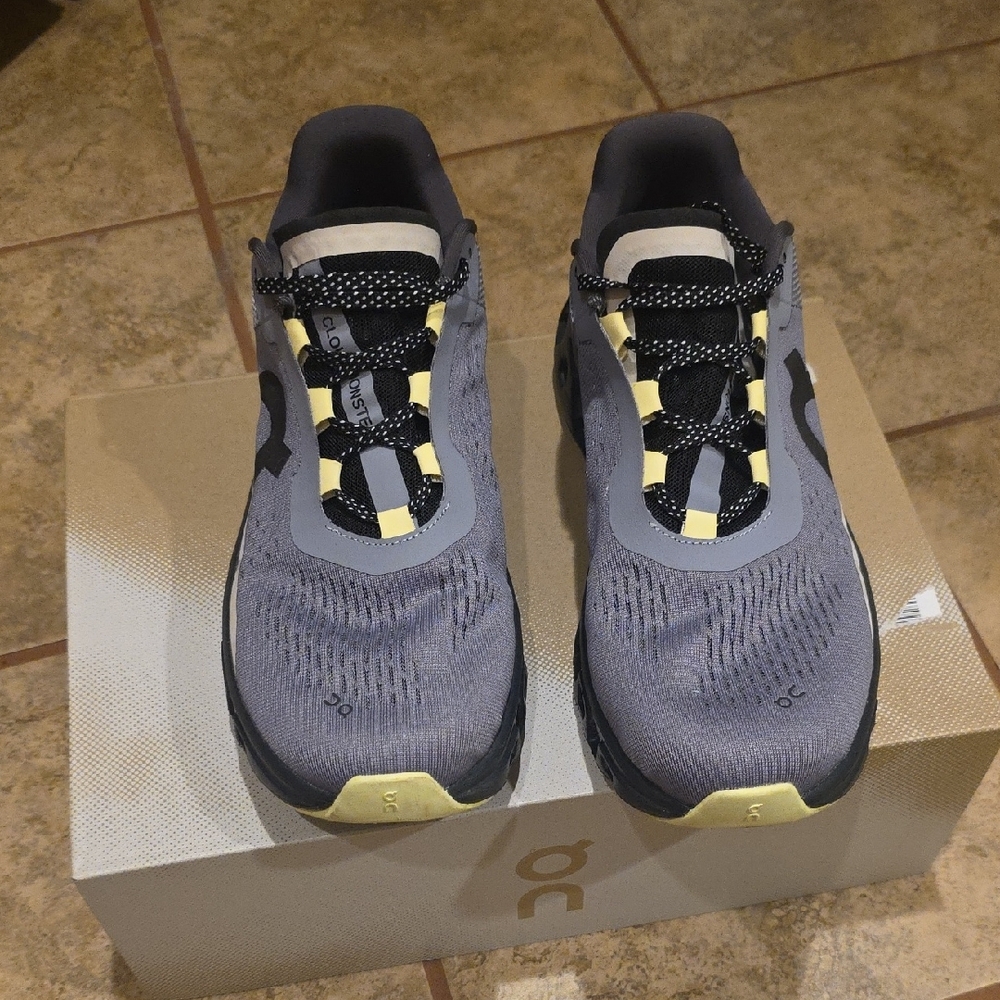On Running Gray and Yellow Athletic Shoes for Performance